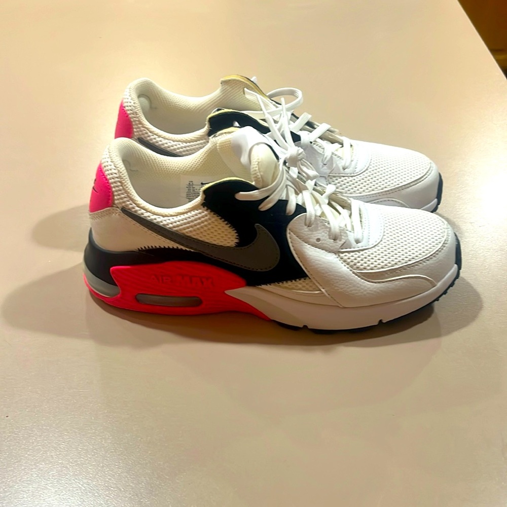 Brand new pink and black Nike air max women’s shoes.